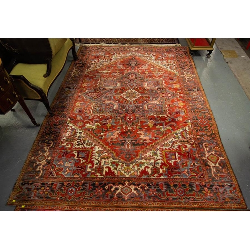 153 - RED GROUND WOOL RUG WITH DIAMOND PATTERNS. 200 X 290 CM