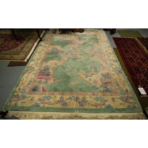 155 - LARGE GREEN GROUND CHINESE RUG   tells the story of a Chinese man in a boat frantically searching fr... 