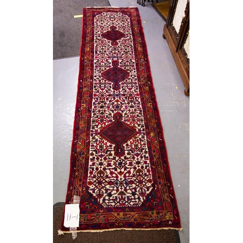 166 - IVORY GROUND MESKIN RUNNER WITH HINTS OF VIBRANT PRINT 310 X 86CM
