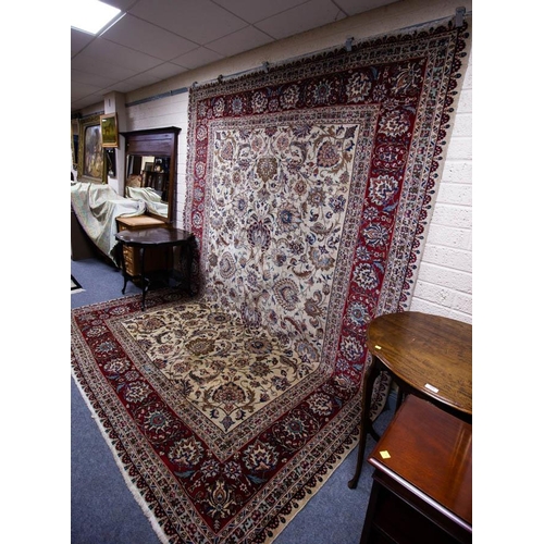 226 - CREAM GROUND FLORAL WOOL RUG WITH RUST BORDER 260 X 355CM