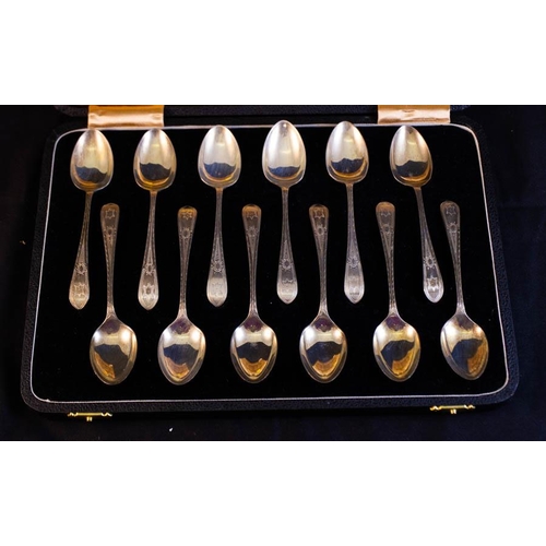 257 - BOXED SET OF 12 SILVER SPOONS