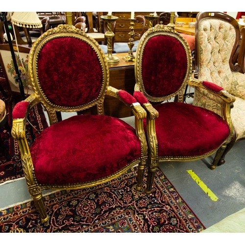 366 - PAIR OF GILT FRAMED OVAL BACK ELBOW CHAIRS