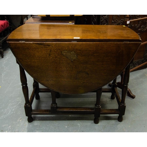 500 - OVAL DROP LEAF OAK TABLE