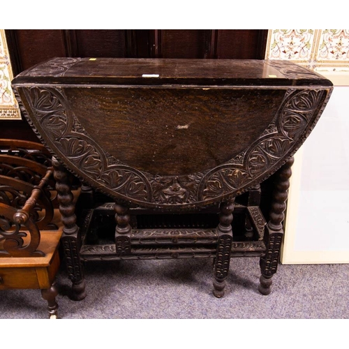 72 - NEAT CARVED OAK DROP LEAF TABLE. 70 CM WIDE