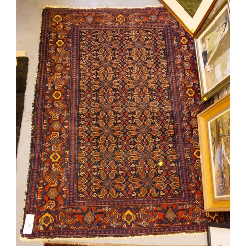 204 - ANTIQUE NAVY GROUND RUG 150 X 110CM