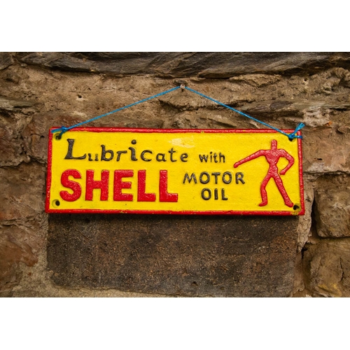 488 - 2 CAST IRON SIGNS. SHELL GARAGE + SHELL OIL