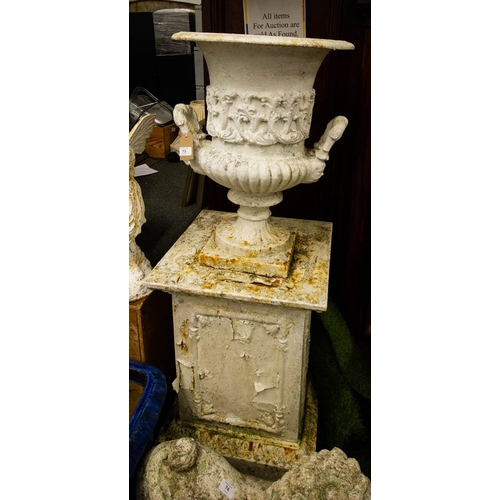 73 - PAIR OF ORNATE ANTIQUE CAST IRON URNS ON SQUARE BASES 125H CM