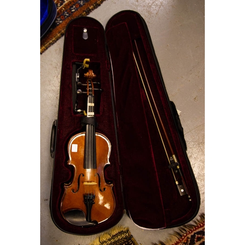 132 - 1/2 STUDENT VIOLIN, BOW + CASE