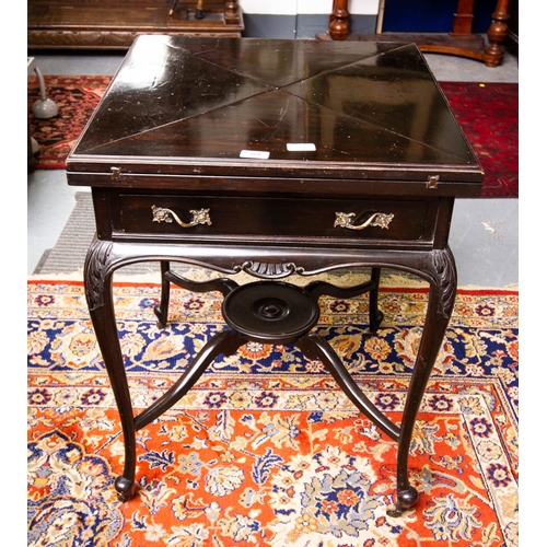 181 - EDWARDIAN EBONISED ENVELOPE  CARD TABLE. 56 X 56 X 74CM HIGH