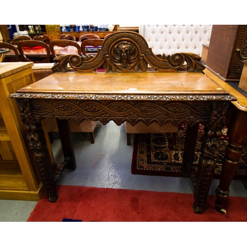 204 - CARVED OAK SIDE TABLE 105W X 45D X 105H CM