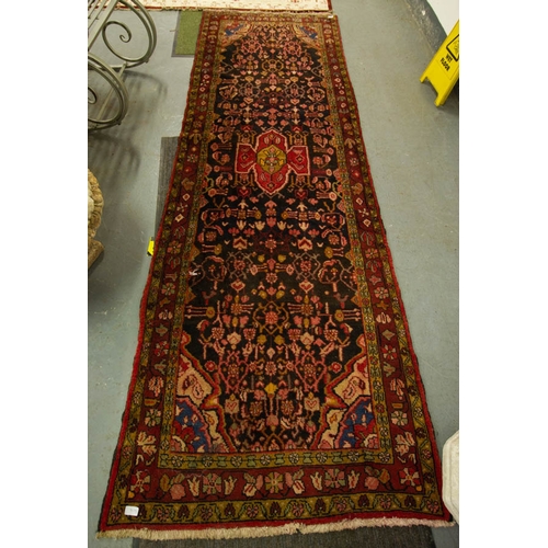 272 - BLACK AND PINK GROUND PERSIAN RUNNER. 310 X 100