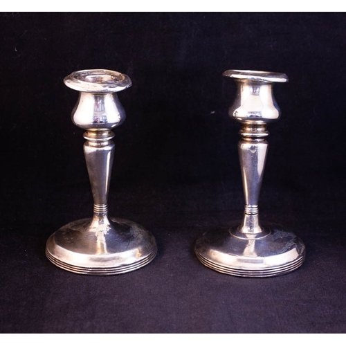 296 - PAIR OF SILVER + BONE KNIFE RESTS + SILVER CANDLE STICK AF