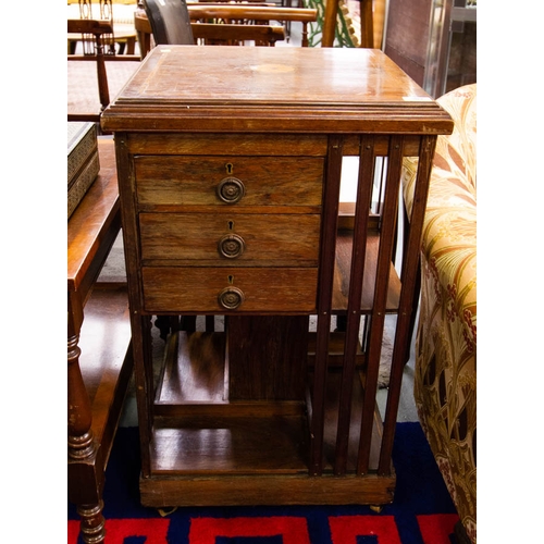 309 - INLAID REVOLVING BOOKCASE WITH DRAWERS. 38 X 38 CM X 78CM HIGH.
ONE BAR MISSING FROM THE SIDE