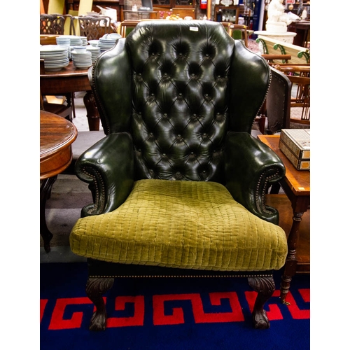 313 - PAIR OF SHAPED BUTTON BACK GREEN LEATHER WING CHAIRS. 80 X 90CM X 110CM HIGH