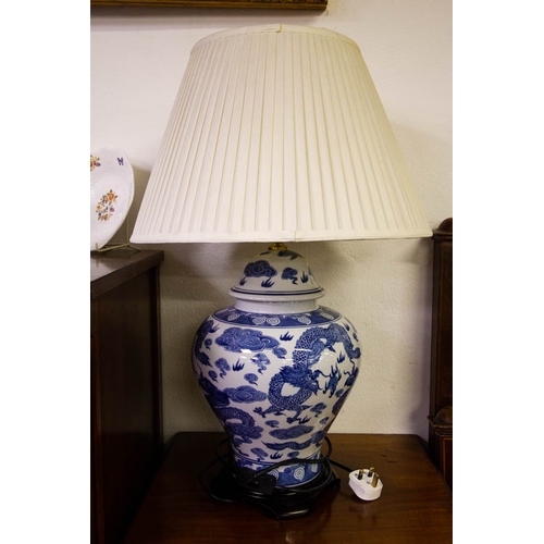 32 - PAIR OF BLUE & WHITE CHINESE STYLE LAMPS WITH WHITE SHADES . 70 CM HIGH