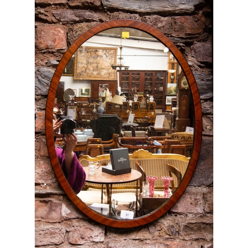 97 - OVAL INLAID MAHOGANY MIRROR. 38 X 63CM