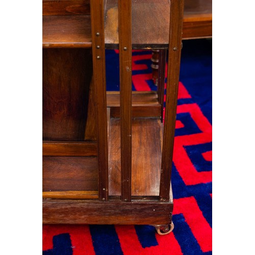 309 - INLAID REVOLVING BOOKCASE WITH DRAWERS. 38 X 38 CM X 78CM HIGH.
ONE BAR MISSING FROM THE SIDE