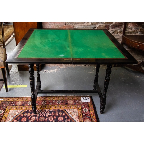 105 - VICTORIAN EBONISED FOLDOVER GAMES TABLE. 92CM X 46CM X 75CM