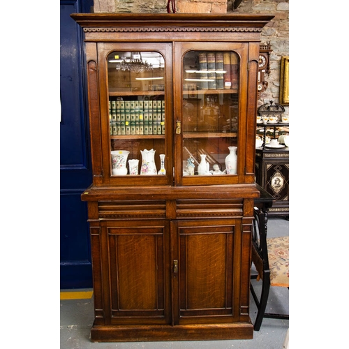 108 - 2 DOOR EDWARDIAN OAK BOOKCASE 111W X 38D X 200H CM