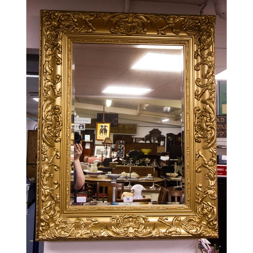 68 - GILDED RECTANGULAR BEVELLED MIRROR. 76CM X 96CM