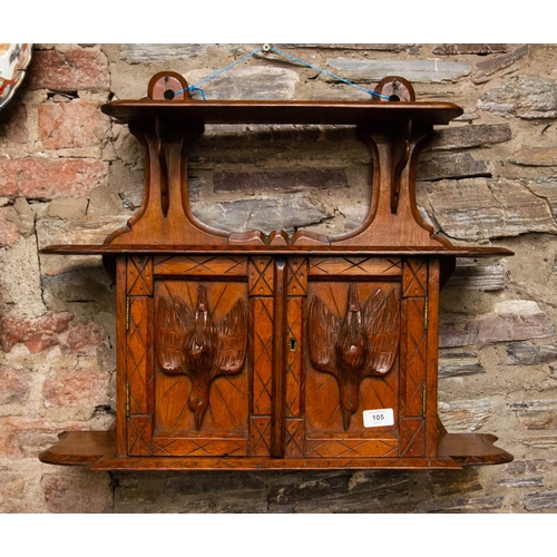 105 - ANTIQUE OAK WALL SHELF WITH CARVED PANEL DOORS. 65 X 20 X 55CM HIGH