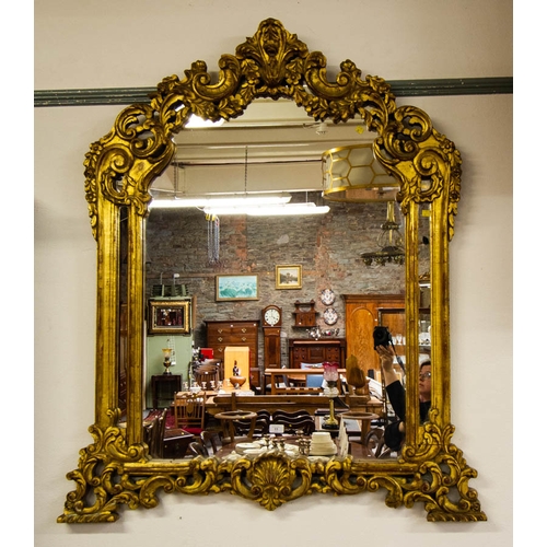 11 - ORNATE GILTWOOD ARCH TOP MIRROR 115 X 135H CM