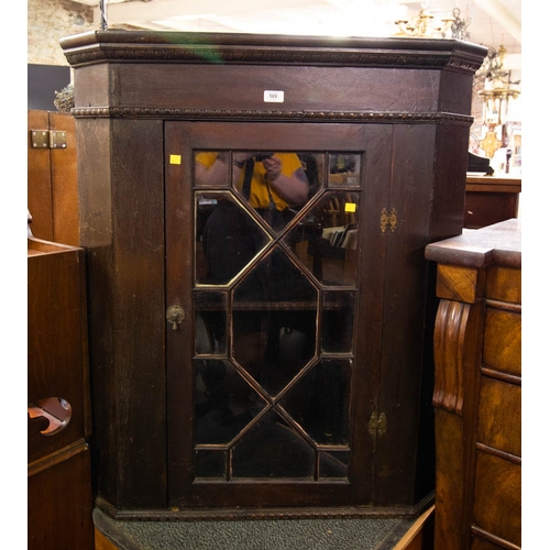 589 - ANTIQUE OAK HANGING CORNER CABINET. 60CM W X 103CM H