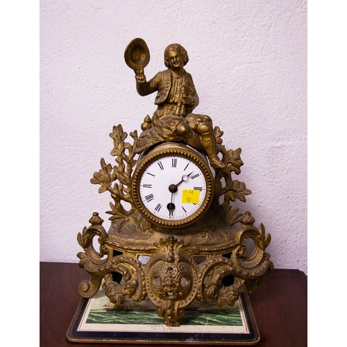 89 - ORNATE GILDED METAL MANTLE CLOCK WITH KEY. 35CM HIGH -  AS FOUND NO GLASS AND REPAIRS