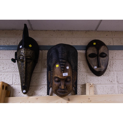 517 - 3 CARVED MASKS - IVORY COAST + 2