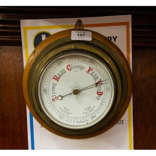 197 - SHIPS ANEROID BAROMETER. 24CM DIAMETER