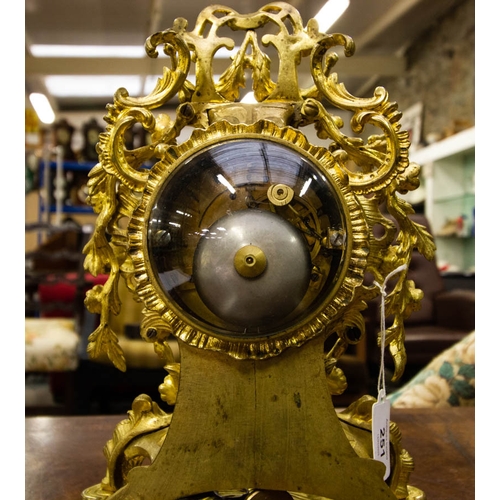 251 - A FRENCH, TWO TRAIN, GILDED ROCOCO TABLE CLOCK WITH SILK SUSPENSION. 30 CM HIGH