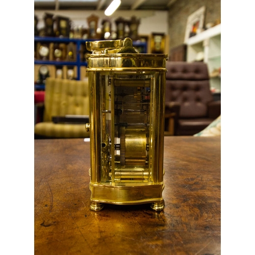 260 - BRASS CARRIAGE CLOCK . DAVID PETERSON.  13 CM HIGH