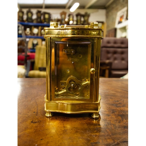 260 - BRASS CARRIAGE CLOCK . DAVID PETERSON.  13 CM HIGH