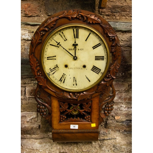 48 - AMERICAN 8 DAY WALL CLOCK WITH APPLIED CARVING IN WALNUT CASE - WARD + CO GREENOCK