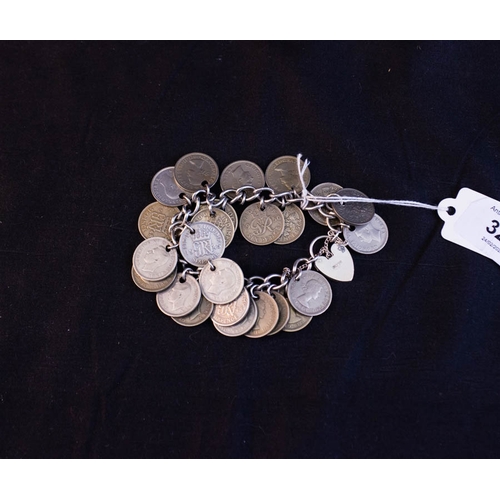 328 - SILVER BRACELET WITH 24X 6 PENCE COINS 82G