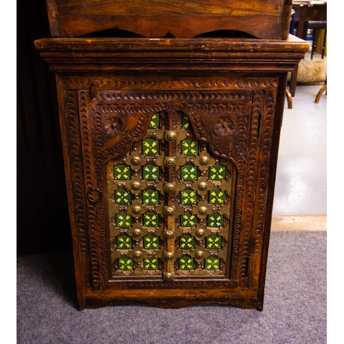 53 - PAIR OF RUSTIC CARVED SINGLE DOOR WITH TILE AND BRASS MOUNTED DOORS . 56 X 44 X 71CM H