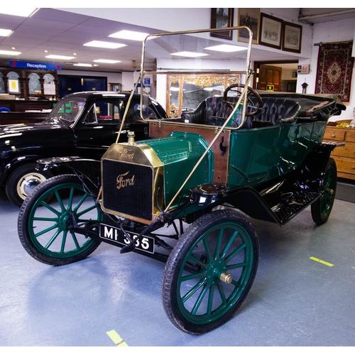 FORD MODEL T.  TOURING. 4 DOOR.
C21/01/1916 APPROX. BRASS RADIATOR . MID GREEN .  REG. NO. M1 385. - LEFT HAND DRIVE.  NO DOCUMENTS