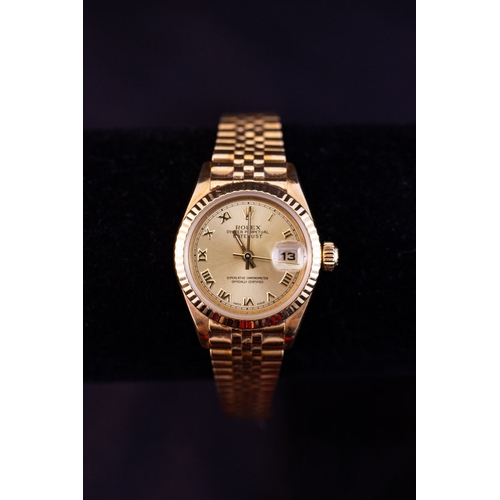 LADIES OYSTER PERPETUAL MOTION DATE ADJUST 18K GOLD ROLEX WATCH WITH BOX, PAPERS + SERVICE PAPERS