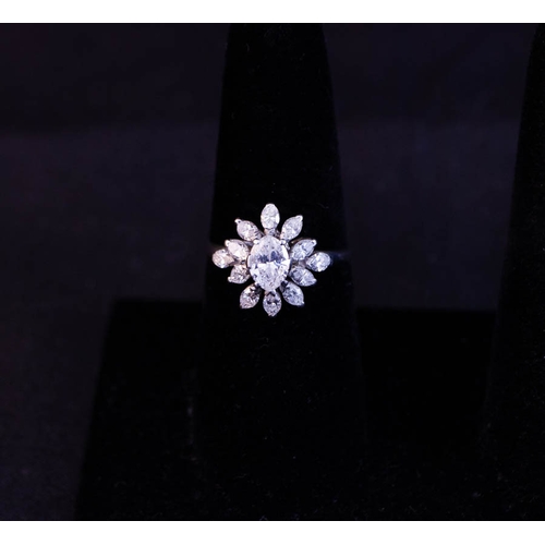 505 - SUPERB DIAMOND CLUSTER RING WITH OVAL DIAMOND CENTRE + DIAMOND PETALS SET IN PLATINUM - 1.6CT DIAMON... 