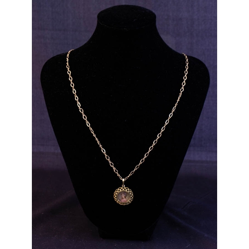 510 - 18K YELLOW GOLD PENDANT WITH 9K CHAIN (6G) - 9G TOTAL WEIGHT