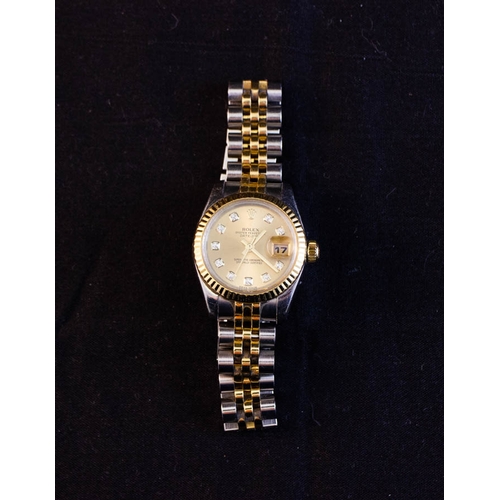 260 - ROLEX LADIES DATEJUST WATCH .
MODEL 179173 CHAMPAGNE 10 DIAMOND. 
OYSTER STEEL & YELLOW GOLD.  AUTOM... 