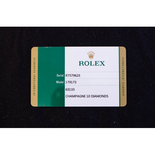 260 - ROLEX LADIES DATEJUST WATCH .
MODEL 179173 CHAMPAGNE 10 DIAMOND. 
OYSTER STEEL & YELLOW GOLD.  AUTOM... 