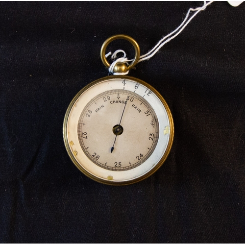 269 - POCKET BAROMETER IN BRASS CASE. 5 CM DIAMETER