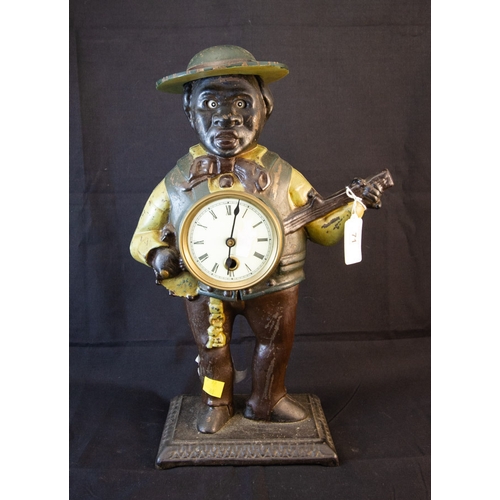 METAL WINKING EYE CLOCK. 38CM HIGH