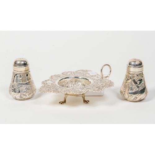 42 - Indian silver coloured white metal beetle-nut holder, decorated with stylised figures of animals, al... 