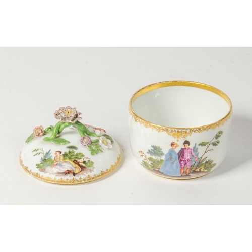 260 - A Meissen circular sugar bowl and cover, decorated with flowers and scenes of lovers.