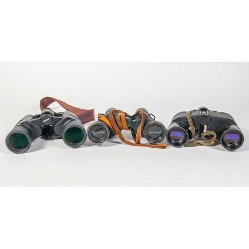 276 - Three pairs of binoculars, including a swift etc.