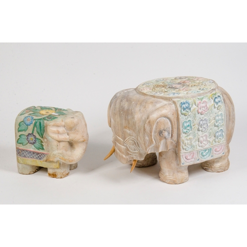 280 - Two carved hard wood studies of elephants, and a set of bowls in a case. 
Large Elephant 9.6 inches ... 