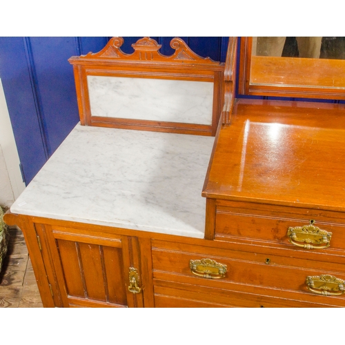 409 - An Edwardian marble topped, sunk section, dressing table, fitted drawers and cupboards, 61 x 41 inch... 