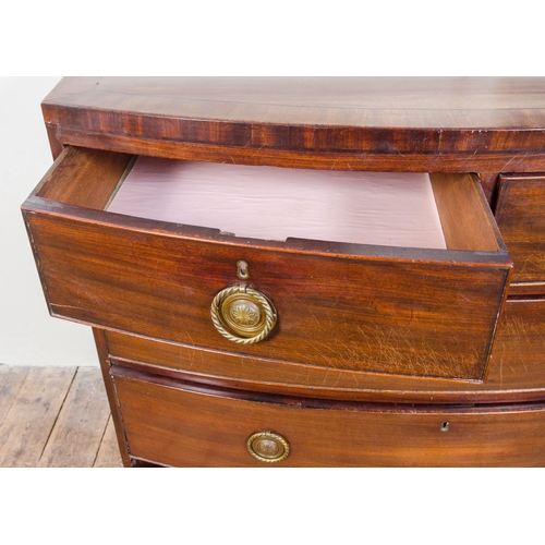 448 - A Georgian mahogany cross banded bow front chest, with 2 short over 3 long graduated drawers, restin... 